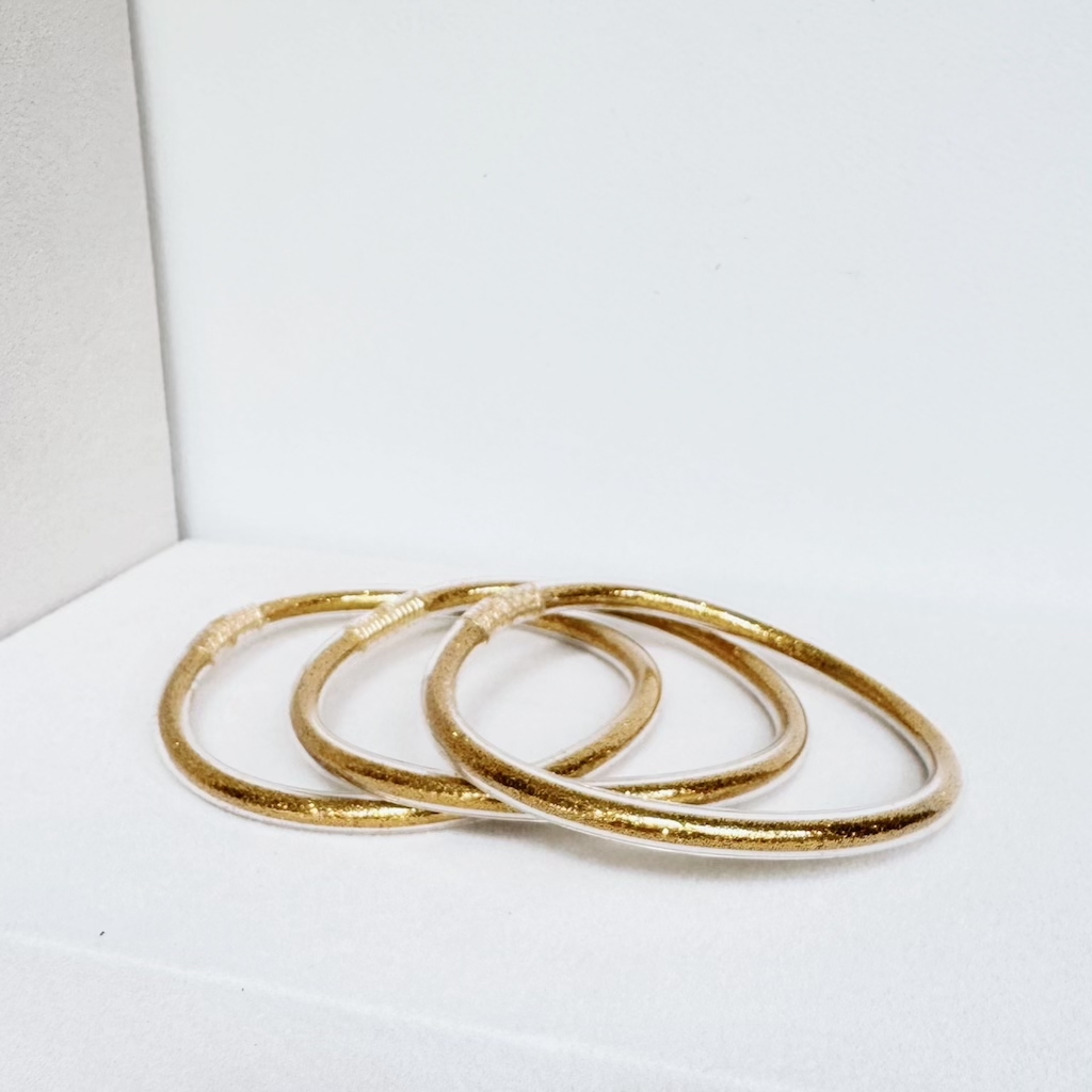 Pulseras de gel doradas