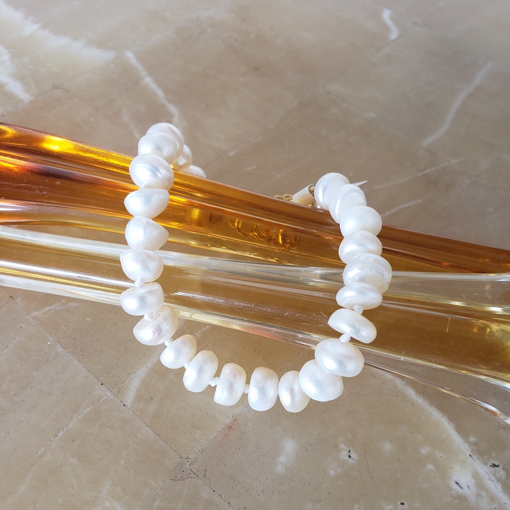 Pulsera de medias perlas
