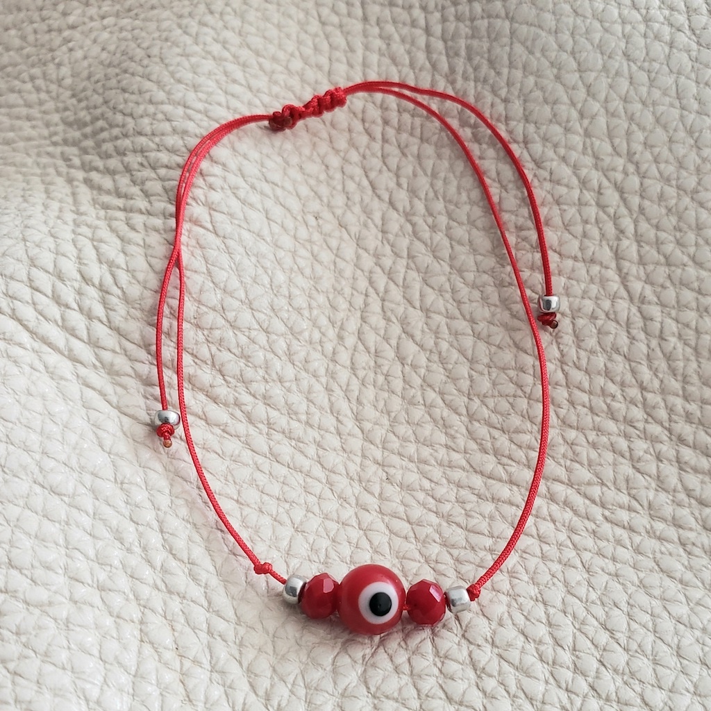 Pulsera ojito con cristales rojos