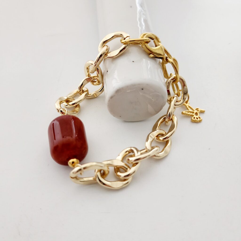 Pulsera cadena dorada cilindro piedra ocre